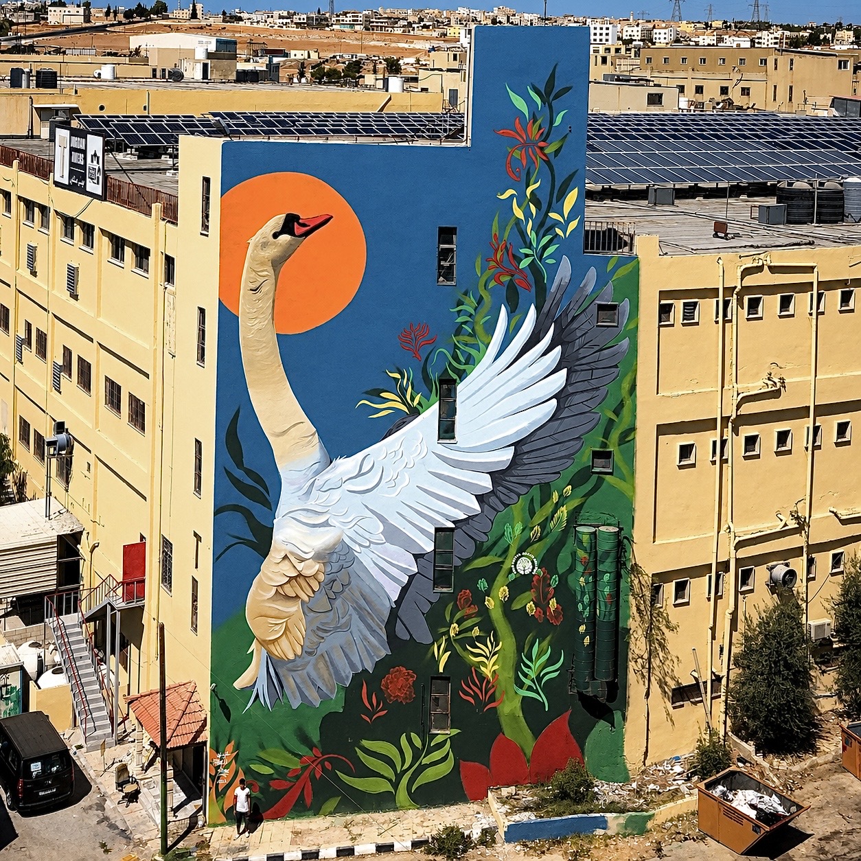 Public spaces — large mural with regal figure and dove